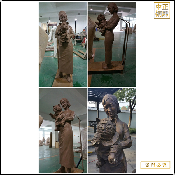 1抱孩子人物雕塑.jpg 1抱孩子人物雕塑.jpg